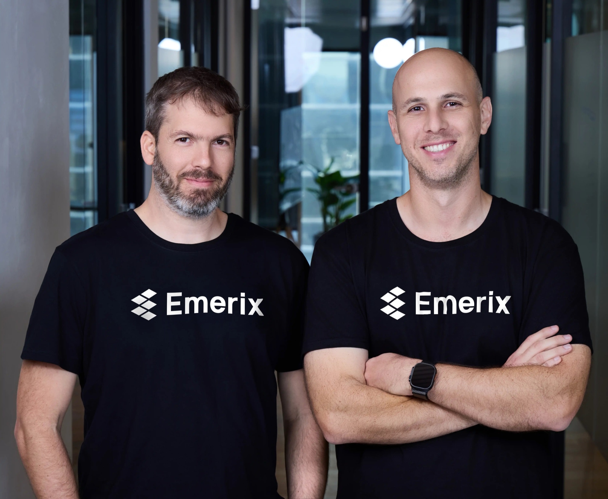 Yotam Ater and Ariel Palones, co-founders of Emerix, in Emerix T-shirts